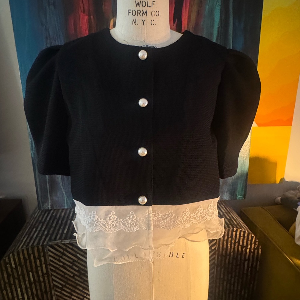 Elegant Black and White Women's Top with Pearl Buttons